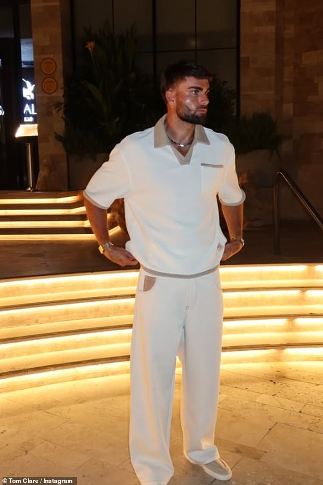 Tom looked smart in a white polo shirt with tan accents which he teamed with matching trousers and coordinating shoes
