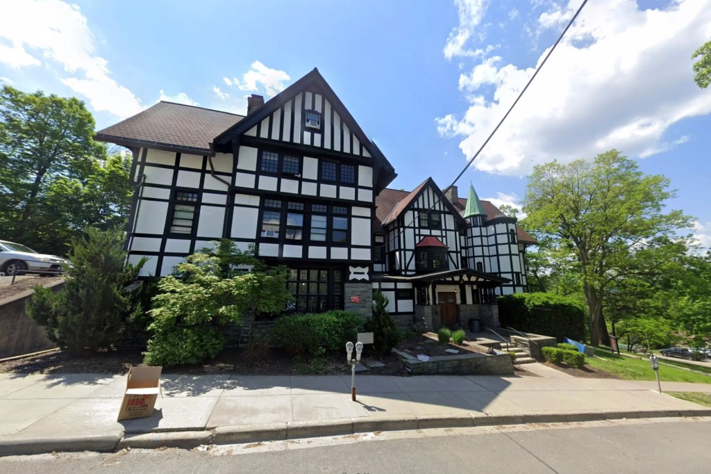 Photograph of the Cornell University Chi Phi fraternity house.